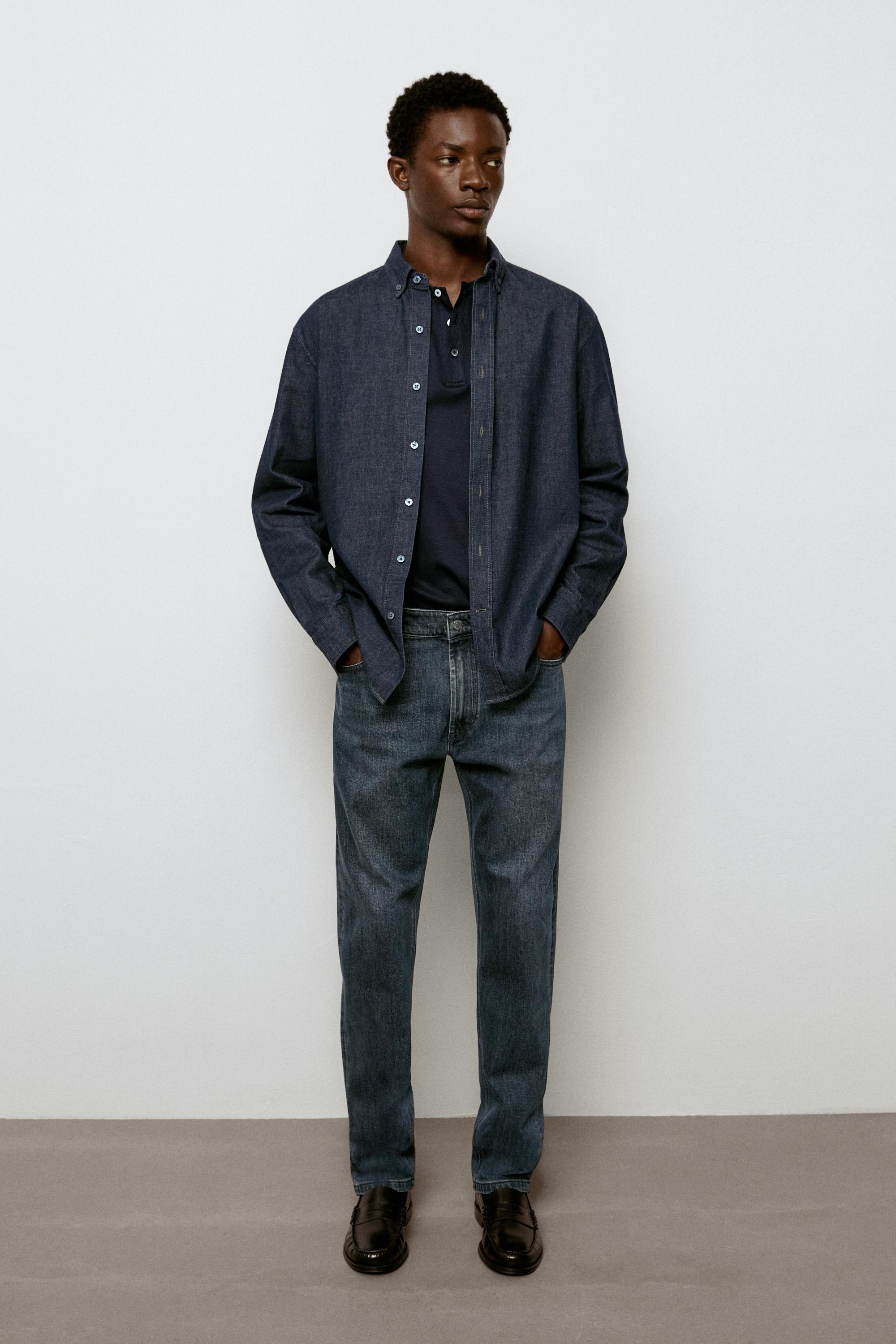 Enzymatic tapered fit jeans